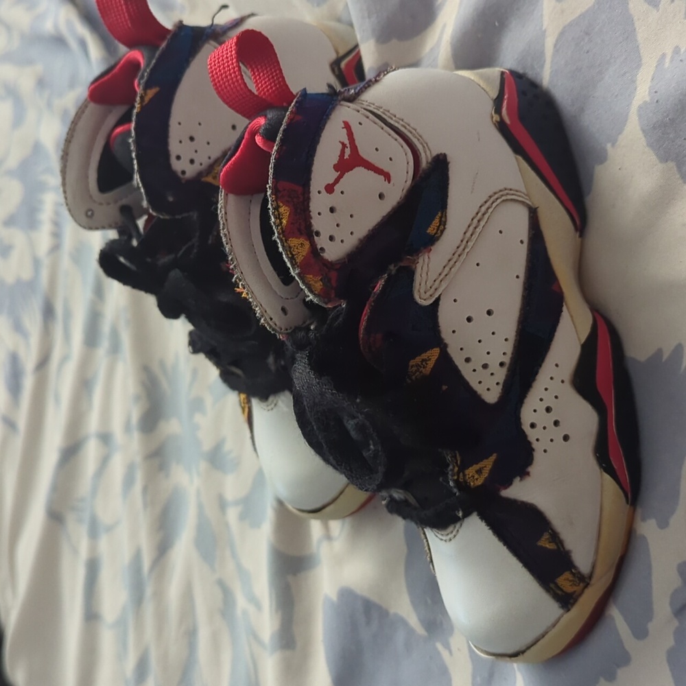 Boys size 11 Nike Air Jordans. White with multi-color accents